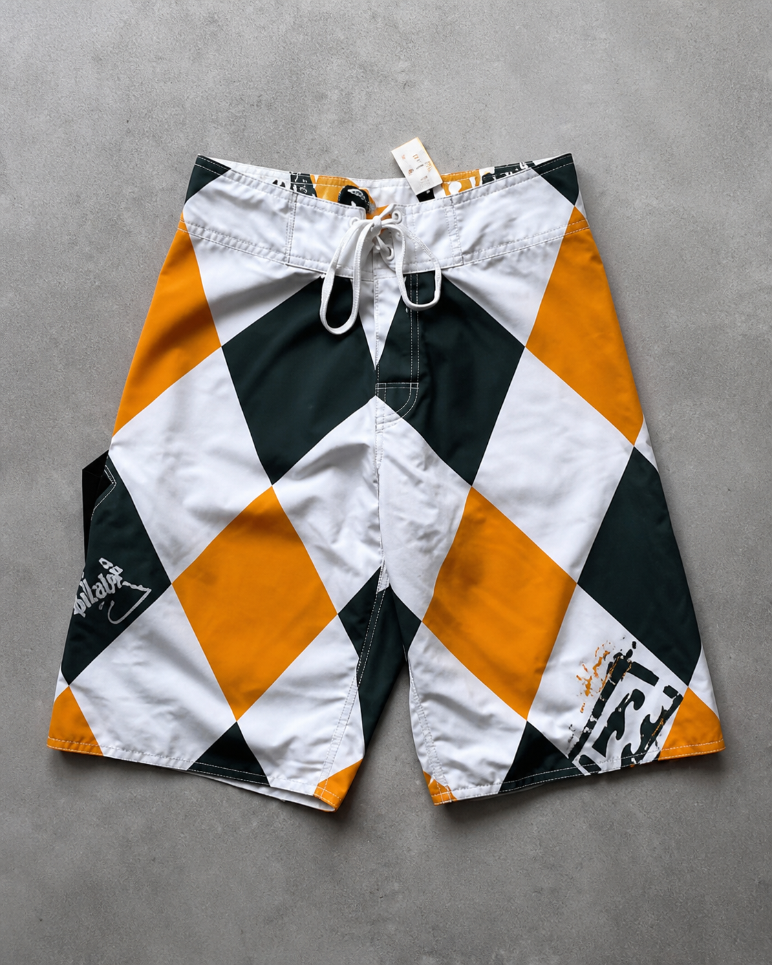 Tropic Argyle Andy Irons-era boardshort reference in orange / green / white