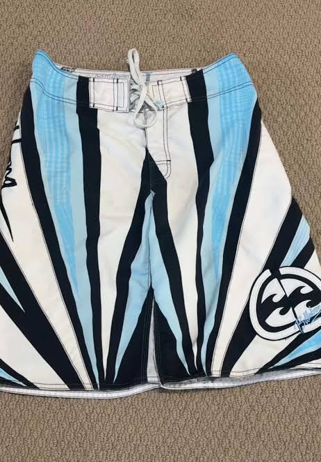 Ice Blue Sun Andy Irons-era boardshort reference in ice blue / white / black