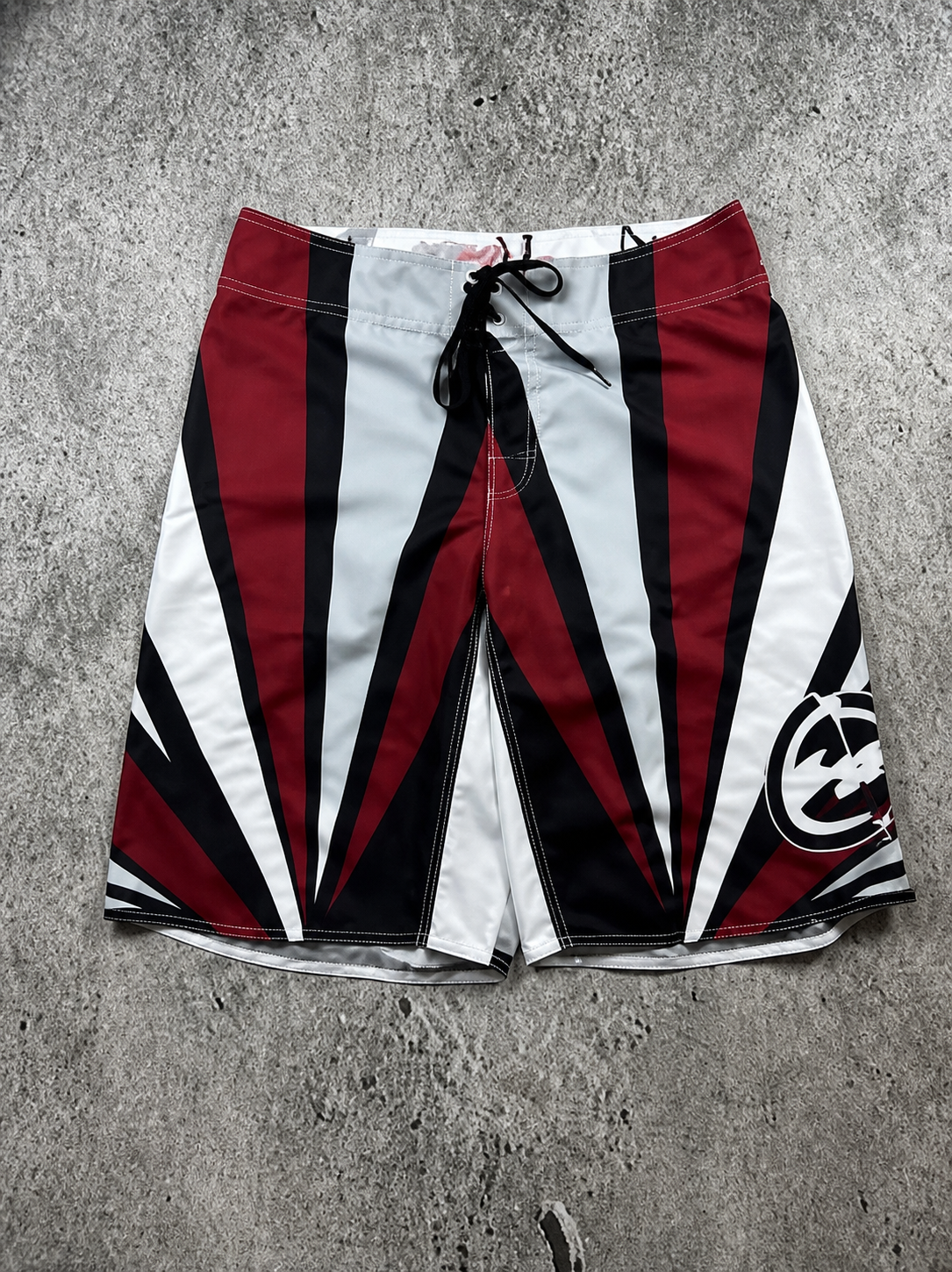 Maroon Sun Andy Irons-era boardshort reference in maroon / black / white